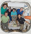 Expedition 31 posing inside the docked Dragon capsule on 29 May 2012.