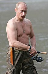 Vladimir Putin wearing a cross necklace