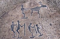 Karelian Petroglyph depicting 5 skiers and a reindeer. These petroglyphs date to 7,000~6,000 years BP.