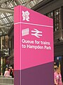 Olympics branding on a sign at Glasgow Central station, showing passengers where to queue for trains to Hampden Park