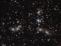 Pandora's Cluster observed by James Webb Space Telescope's NIRCam as part of UNCOVER program (15 February 2023).[11]