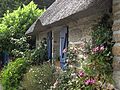 Image 12Roses, clematis, a thatched roof: a cottage garden in Brittany (from Garden design)