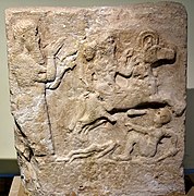 Assyrian scribe documenting a battle scene (9th–7th century BCE)