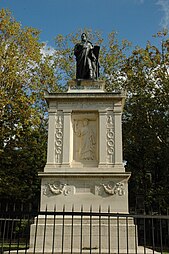 Neoclassical Doric pilasters on the Grave of Casimir Pierre Perier, Père-Lachaise Cemetery, Paris, designed by Achille Leclère, and sculpted by François-Joseph Bosio and Jean-Pierre Cortot, 1837