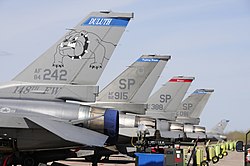 Three F-16CJ Block 50 Fighting Falcons from Spangdahlem Air Base after arriving to join the 148th Fighter Wing at Duluth ANGB during 2010. In front is an F-16C Block 25C from the 148th FW that was replaced.
