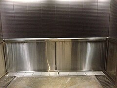 Modern trough urinal in an art museum in Brisbane, Australia