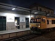 Train arriving at the station during the night, 2023