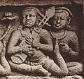 Hindu, Buddhist. 9th century AD, Borobudur (second gallery, main wall). Girl in a dance position playing a lute.