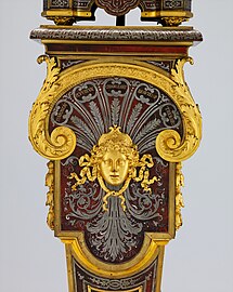 Baroque mascaron on the pedestal of a clock, designed and made by André Charles Boulle, c.1690, gilt wood, Metropolitan Museum of Art, NYC