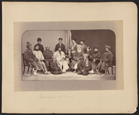 Dōst Moḥammad Khan seated slightly to the right of center in this photograph. To Dōst Moḥammad's right, the first figure in a white chapan (overcoat) is his son and successor Sher ʻAlī Khān (1825–1879), who ruled Afghanistan from 1863 to 1879. Abd al-Raḥmān Khān (c. 1844 – 1901), the grandson of Dōst Mohammad and future "Iron Amir" of Afghanistan, is on Dōst Moḥammad's far left.