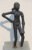 The Dancing Girl; c. 2400–1900 BC; bronze; height: 10.8 cm; National Museum (New Delhi, India)[188]