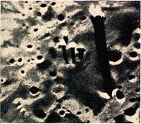 Photograph taken by Lunar Orbiter 2 on November 20, 1966, 29 miles (47 km) above the lunar surface, over the Sea of Tranquility.