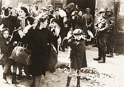 The infamous Warsaw Ghetto boy photograph from the Stroop Report (Blösche with submachine gun on the right).