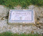 a colour photograph of a gravestone