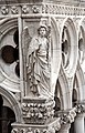 Statue of Archangel Gabriel (15th century), adorning the top of the northwest corner pillar of the Palazzo Ducale in Venice