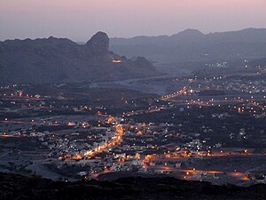 Al-Hamra sunset, with the Central Hajar Mountains in the background