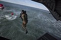 A member of the Army National Guard's 3rd Battalion, 20th Special Forces Group (Airborne) combat dive team helo-casts in Florida waters from a CH-47 Chinook helicopter at Naval Station Mayport, May 1, 2015. The divers were performing closed circuit dive training, help-casting and additional maritime training required to complete their re-qualification and familiarization.