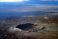 Image 20Meteor Crater in Arizona. Created 50,000 years ago by an impactor about 50 metres (160 ft) across, it shows that the accretion of the Solar System is not over. (from Formation and evolution of the Solar System)