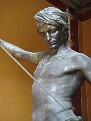 Bronze statue of David (a "clothed" version of Mercié's David) inside the University of Copenhagen.
