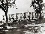 The ruined palace during the Civil War, before being rebuilt into the current palace