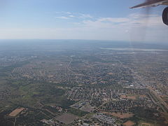 Gaborone from the air, dam in the distance