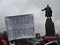 An anti-government poster at a rally on Freedom Square, in Kharkiv