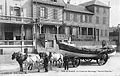 The lifeboat in front of holiday chalets about 1900