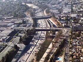 Randy's Donuts can be seen from airplanes landing at LAX (center left, near cars waiting at Manchester Boulevard). Click on photo to see larger version.