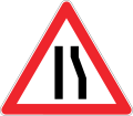 Road narrows on right side