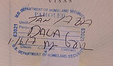 A stamp applied to the Mexican passport of a DACA recipient entering the United States with Advance Parole at John F. Kennedy International Airport in January 2017, with handwritten annotations indicating the passport holder was paroled into the United States.