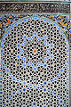 Geometric patterns in zellij tilework at the Al-Attarine Madrasa in Fes