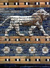 A lion against a blue background from the Ishtar Gate of ancient Babylon. (575 BC)