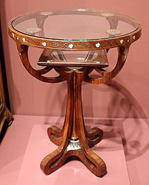 Table of wood, glass, and inlays of brass and abalone shell by Eugenio Quarti (1900)