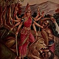 Durga is depicted in the Hindu pantheon as a Goddess riding a lion and with many arms, each carrying a weapon to defeat Mahishasura or the buffalo demon