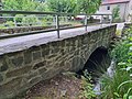 Steinbogenbrücke über den Mühlgraben