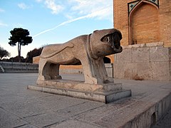 One of the two stone lions of the Khaju Bridge