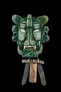 Zapotec mosaic mask that represents a Bat god, made of 25 pieces of jade, with yellow eyes made of shell. It was found in a tomb at Monte Albán