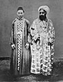 A Meccan merchant (right) and his Circassian slave. Entitled, 'Vornehmner Kaufmann mit seinem cirkassischen Sklaven' [Distinguished merchant and his circassian slave], 1888.