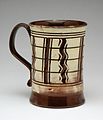 English Slipware mug, ca. 1740