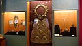Old regalia of the image including its breastplate, halos, crowns, scepters, baton, and vestments at the museum.