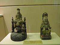 2 statues of Quan Âm (Avalokiteśvara) in the Nguyễn dynasty at the Vietnam National Museum of History, Vietnam