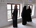 Yemeni women wearing abayat