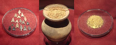 Japanese commodity money before the 8th century, including arrowheads, rice grains, and gold powder. Now in the Japanese Currency Museum.