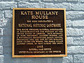 Informational commemorative plaque located on the brick façade between addresses 350 and 352 on Eighth Street in downtown Troy, NY