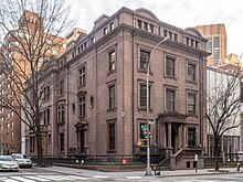 The Isaac Newton Phelps house at 231 Madison Avenue, a brownstone house, as seen from diagonally across Madison Avenue and 36th Street