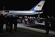 Honor guards carry the casket of former President Gerald R. Ford upon arrival to Andrews Air Force Base in Maryland, Saturday, December 30, 2006.