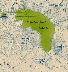A map with contour lines depicting the terrain surrounding a crescent-shaped lake