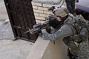 A Ranger from the 2nd Ranger Battalion providing overwatch during combat operations in Iraq, 23 November 2006