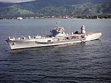 USS Blue Ridge in the Bay of Dili in 2000, with Dili in the background