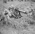 Vickers machine-gun of the 1st Manchester Regiment in Malaya, 1941.